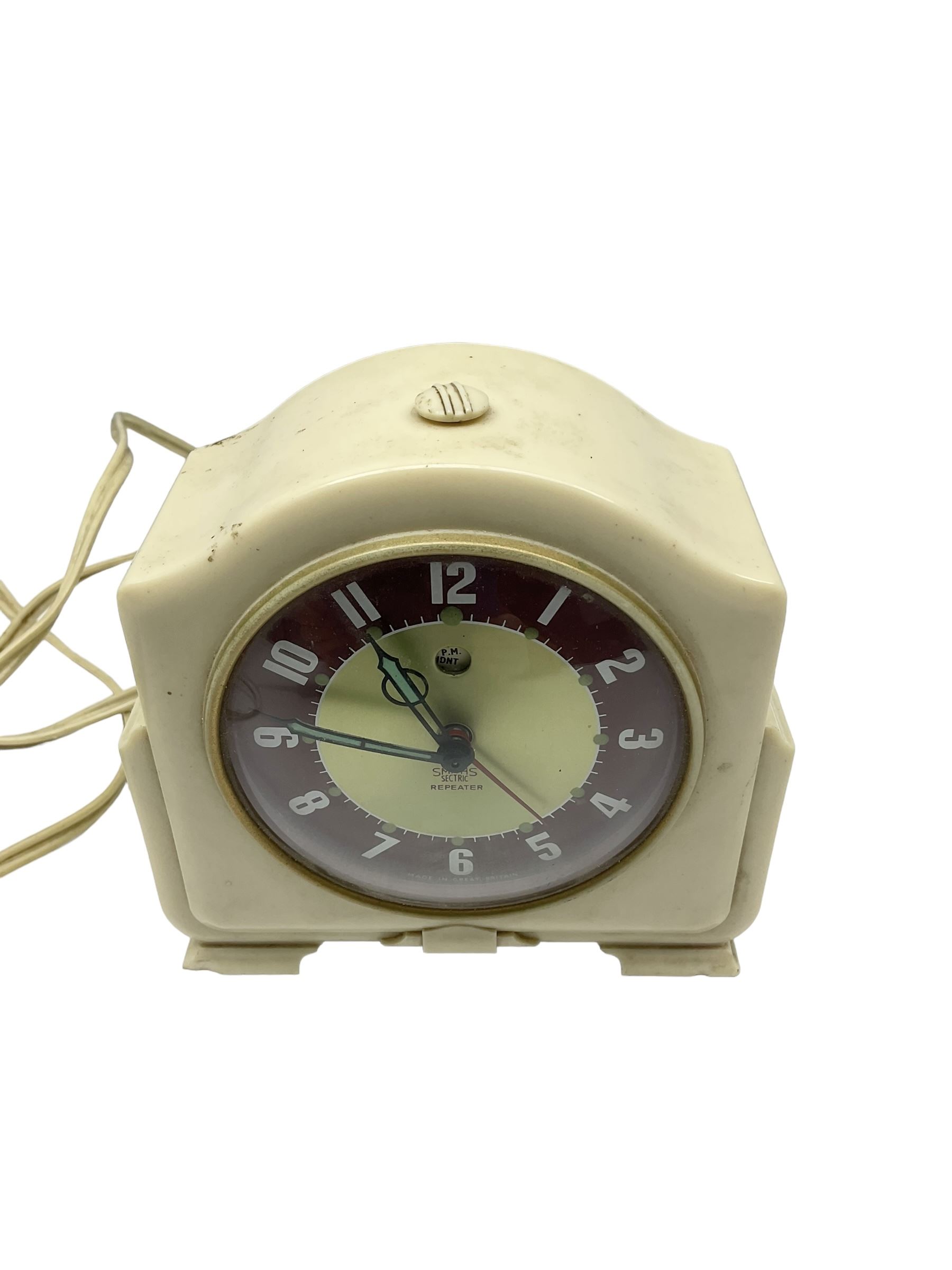 Smiths - Two 1950's Smiths mains operated Sectric clocks in Bakelite cases. Circular office wall clock with Arabic numerals and spade hands inscribed LNER. Ivory Bakelite cased mantle clock with alarm and repeat function.