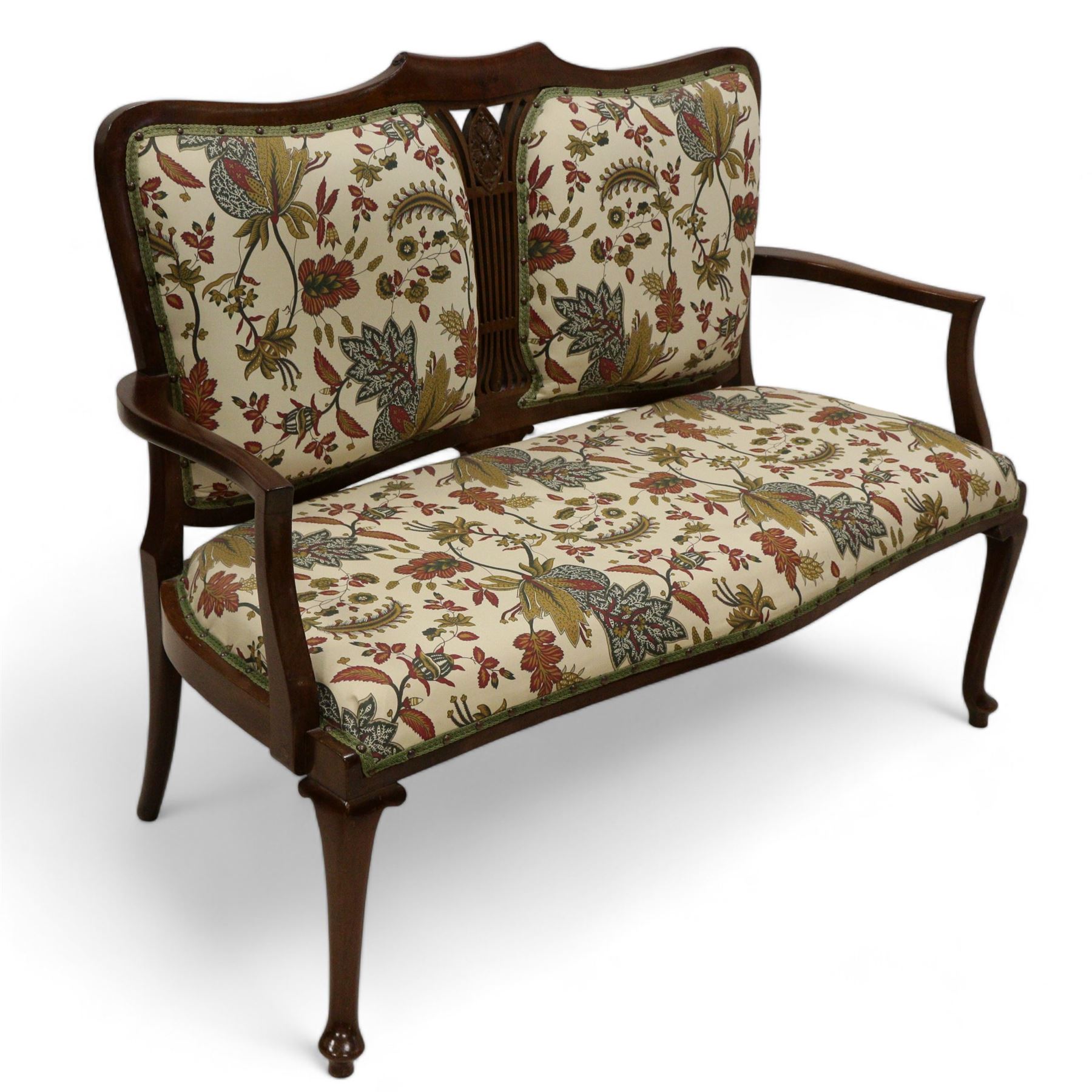 Edwardian mahogany framed two seat settee, upholstered in cream foliate fabric