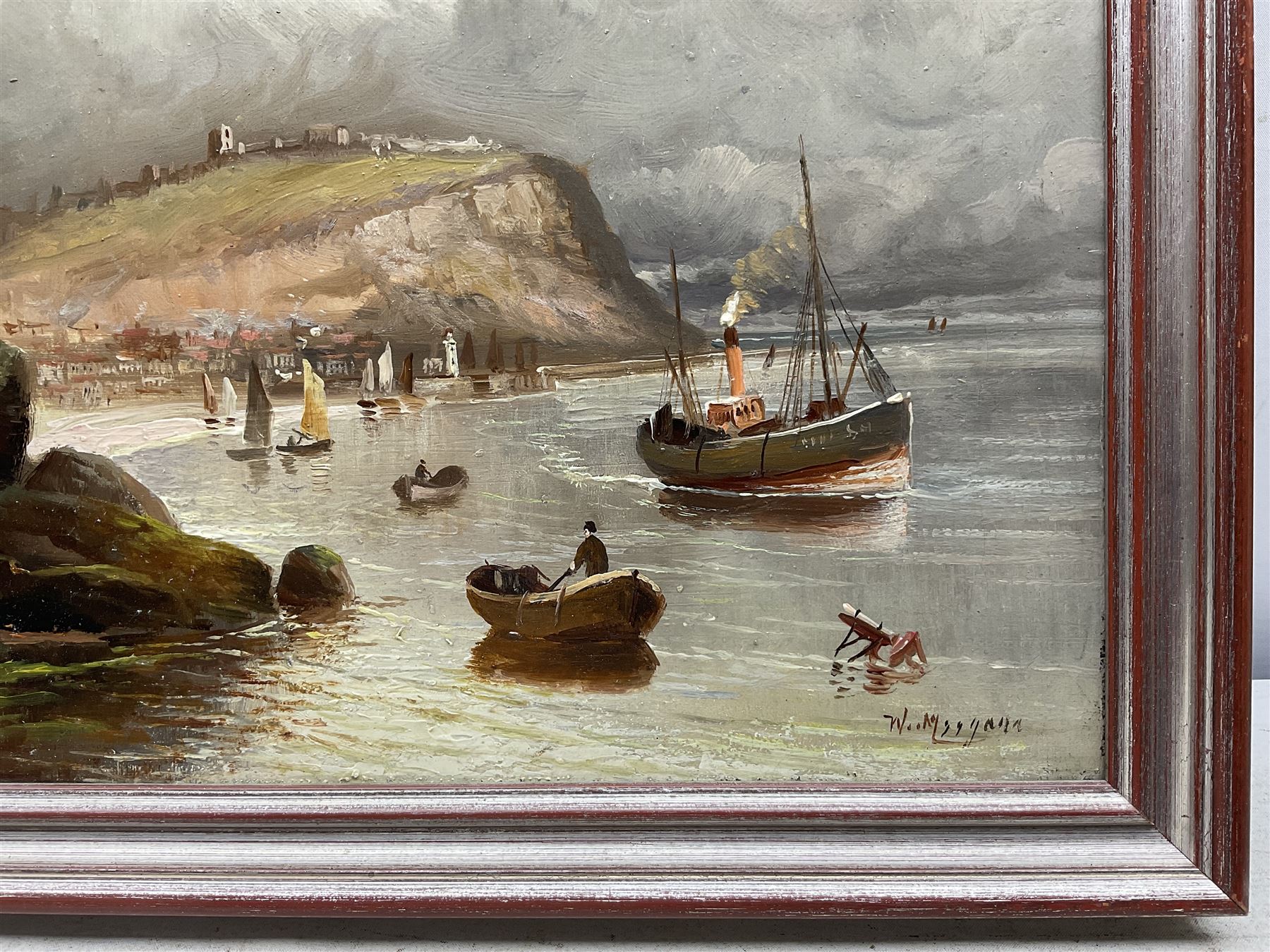 Walter Linsley Meegan (British c1860-1944): Scarborough South Bay and Whitby Harbour, pair oils on canvas signed 24cm x 34cm (2)