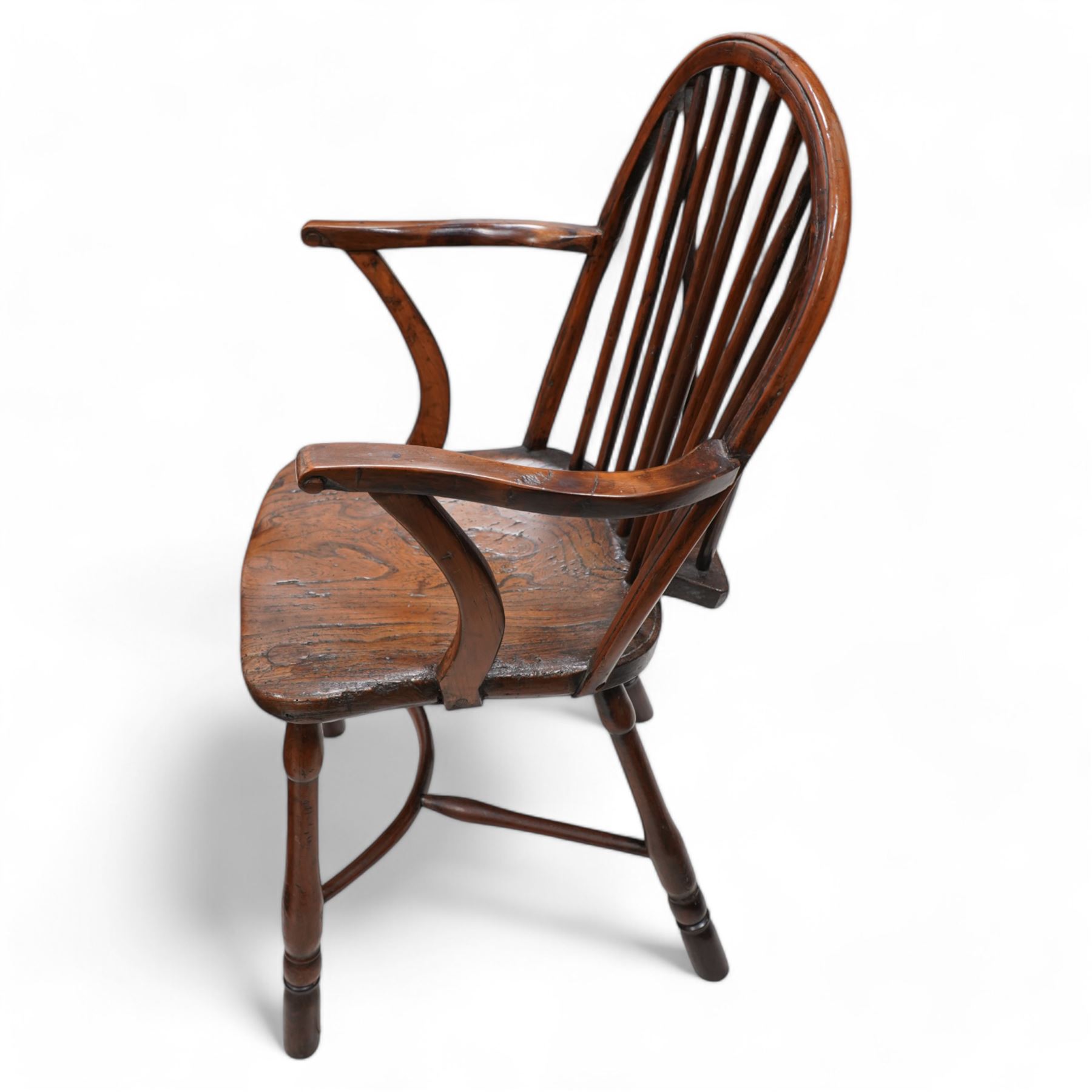 19th century yew wood and elm Thames Valley Windsor armchair, hoop and stick back over shaped arms, dished elm seat on turned supports united by crinoline stretcher 