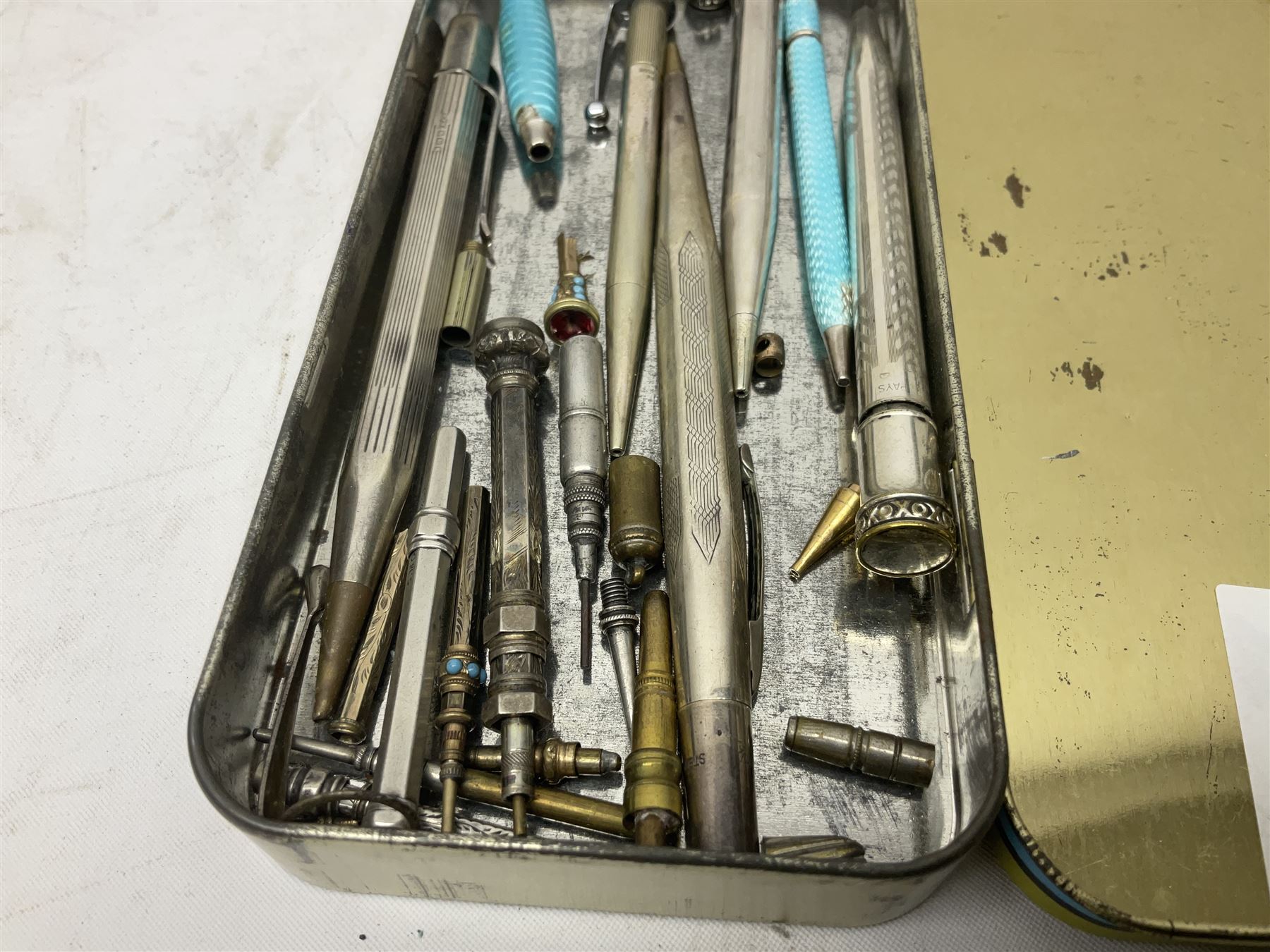 Collection of silver and other propelling pencils, including guilloche enamel example and oddments 