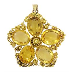 Gold five stone oval citrine flowerhead pendant