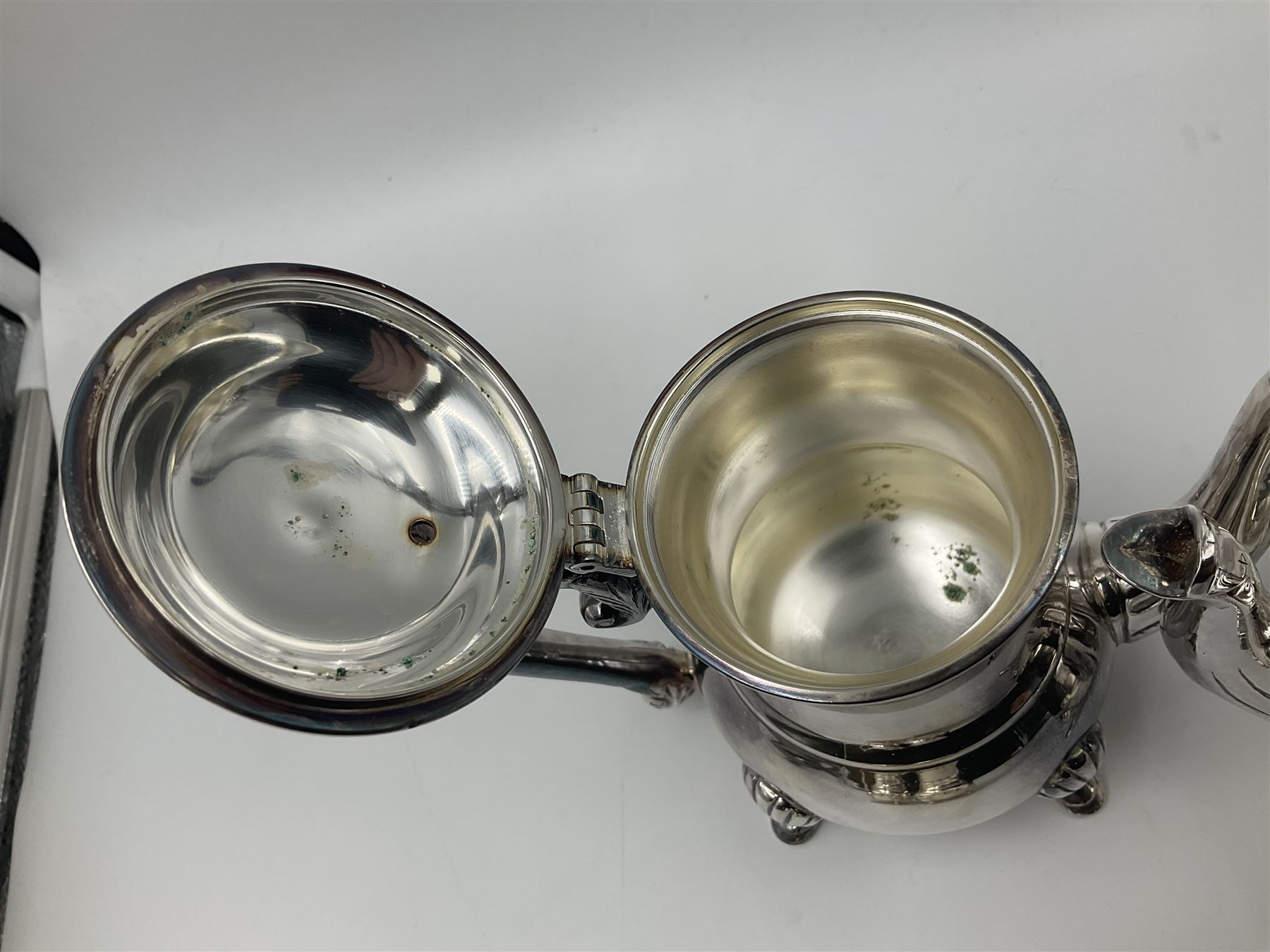 Miniature silver plated four piece tea service, comprising coffee pot, teapot, milk jug and sugar bowl, stamped GRC EPNS beneath, coffee pot H16cm