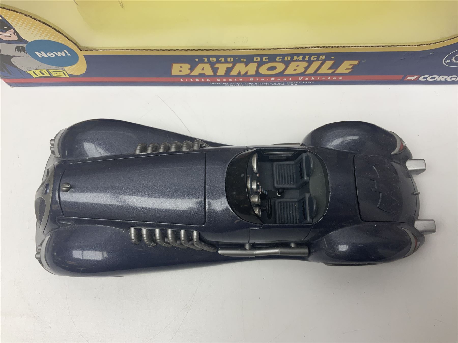 Five Corgi Batmobile die-cast vehicles from the DC Comics collection, to include 1940’s DC Comics BMBV2 1:18 and BMBV1 1:24 scale Batmobiles, all in original boxes 