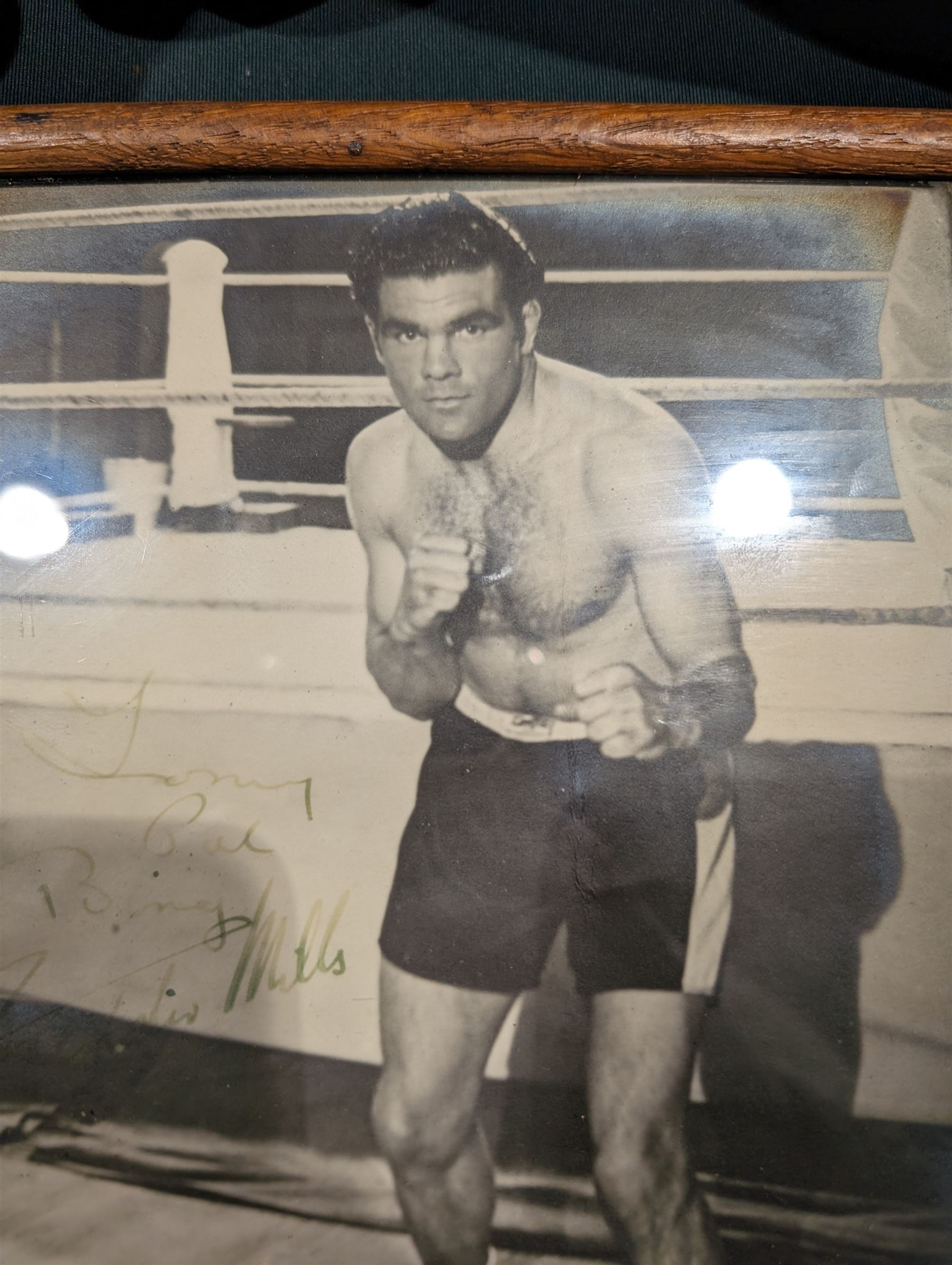 Signed photograph of British boxer Freddie Mills, together with a framed print of boxers Joe Louis and Billy Conn, a signed picture of Giacomo Agostini and a pair of 1930s brown leather boxing gloves