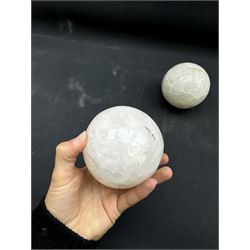 Pair of milk calcite spheres, D10cm 