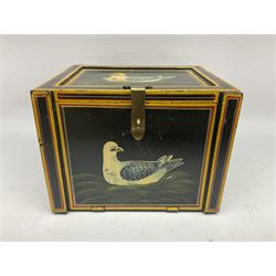 Small wooden collectors chest, painted to each side with birds upon a black ground within red and yellow borders, opening to reveal a compartmentalised interior containing one long drawer above two smaller drawers, H13cm, W18cm, D14.5cm