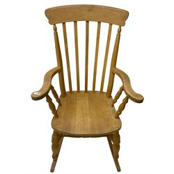 Farmhouse style beech rocking chair, shaped cresting rail on vertical slats, on turned front supports joined by swell-turned double H stretcher base