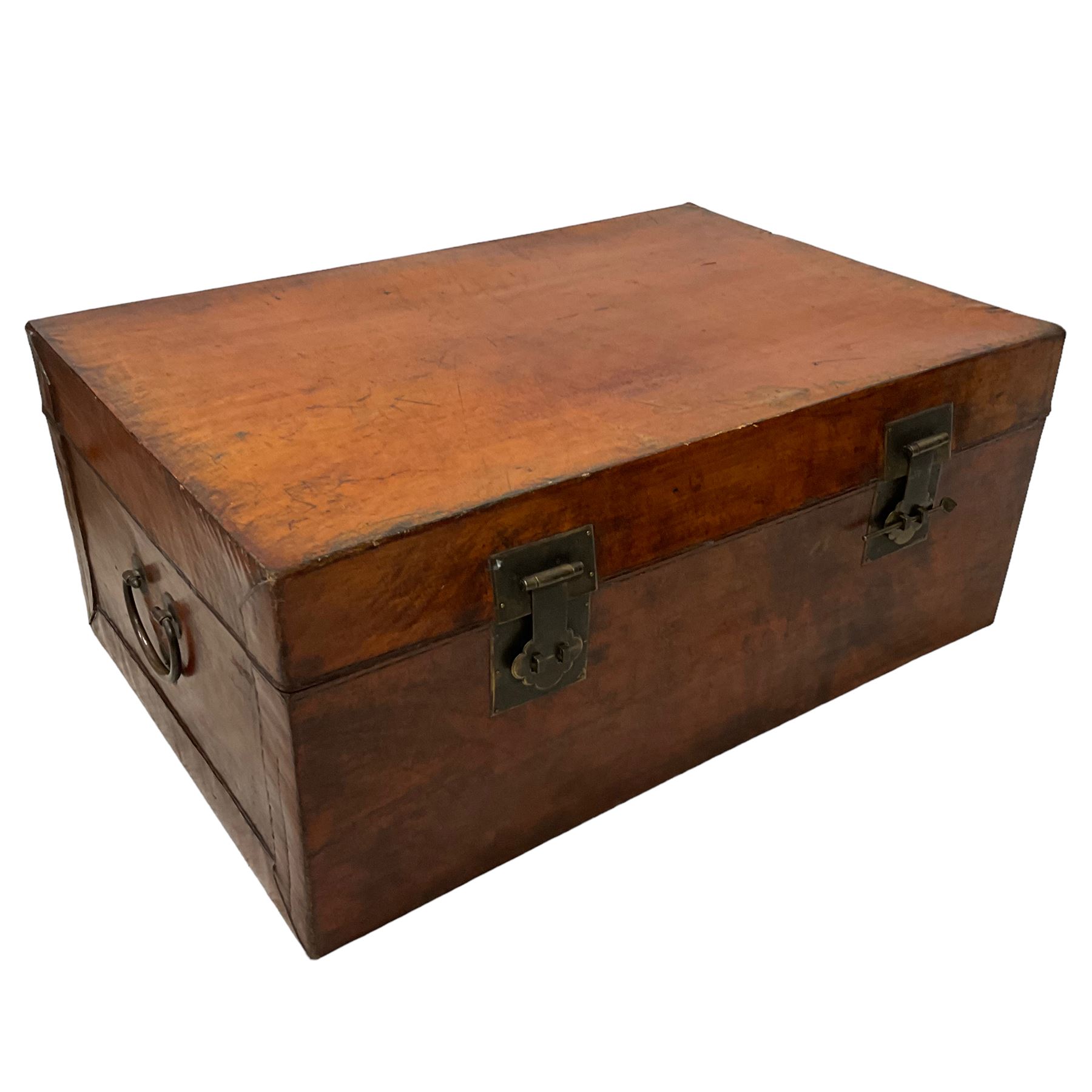 Chinese leather bound and wooden trunk, fitted with metal locks and twin carrying handles, on ebonised stand 