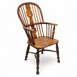 19th century elm and beech Windsor armchair, double hoop and stick back with shaped and pierced splat, dished seat on turned supports united by crinoline stretcher 