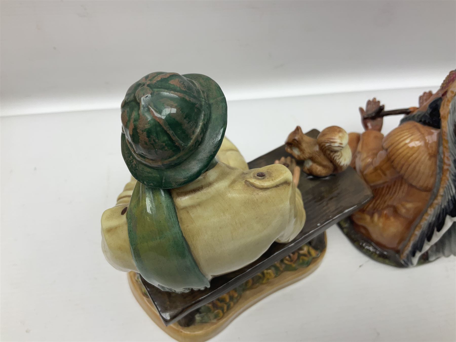 Three Royal Doulton figures, comprising The Chief HN2892, Lunchtime HN2485 and Past Glory HN2484