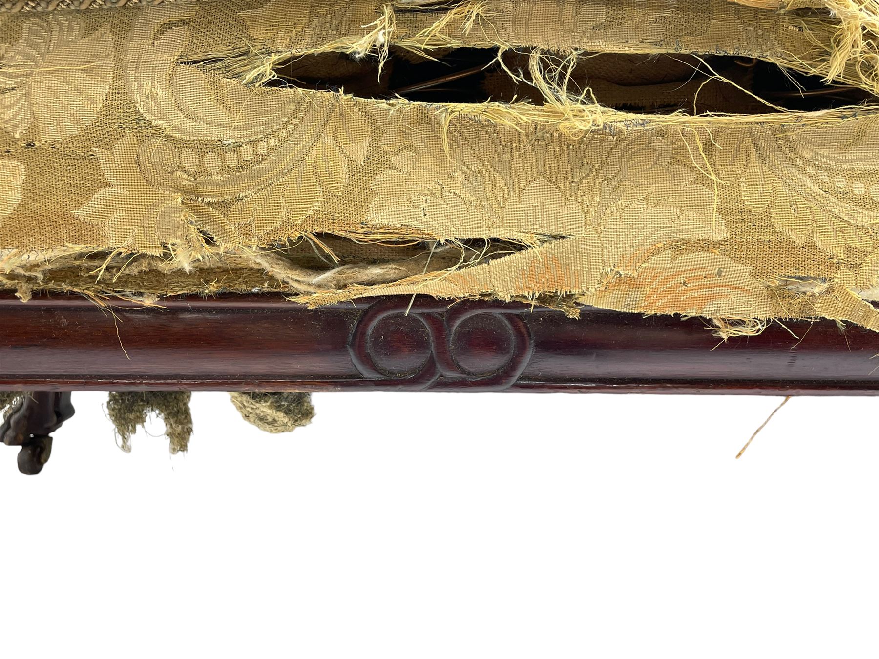 19th century mahogany settee, rolled S-scrolled arms carved with lion masks and acanthus leaf scrolls, the lower moulded rail carved with scrolling design, raised on carved paw feet with recessed brass and ceramic castors 