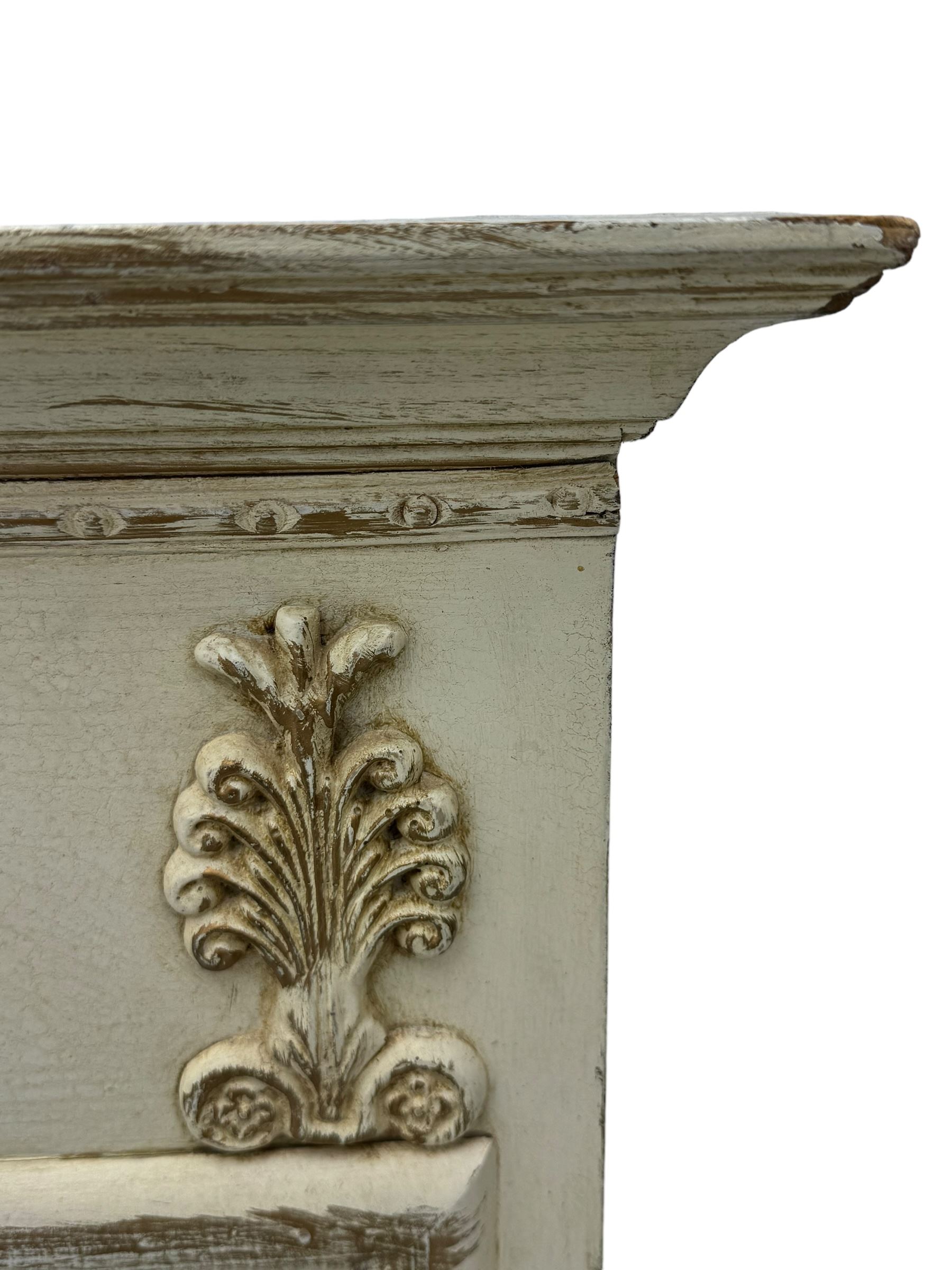 French style white painted pier glass mirror, decorated with scrolled acanthus leaf and anthemion mounts, bevelled mirror plate 