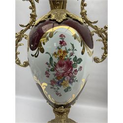 Twin handled vase, the ceramic urn form body decorated with floral sprigs and figural panel, the metal handles designed as vines, together with a similar ewer, vase H75cm 