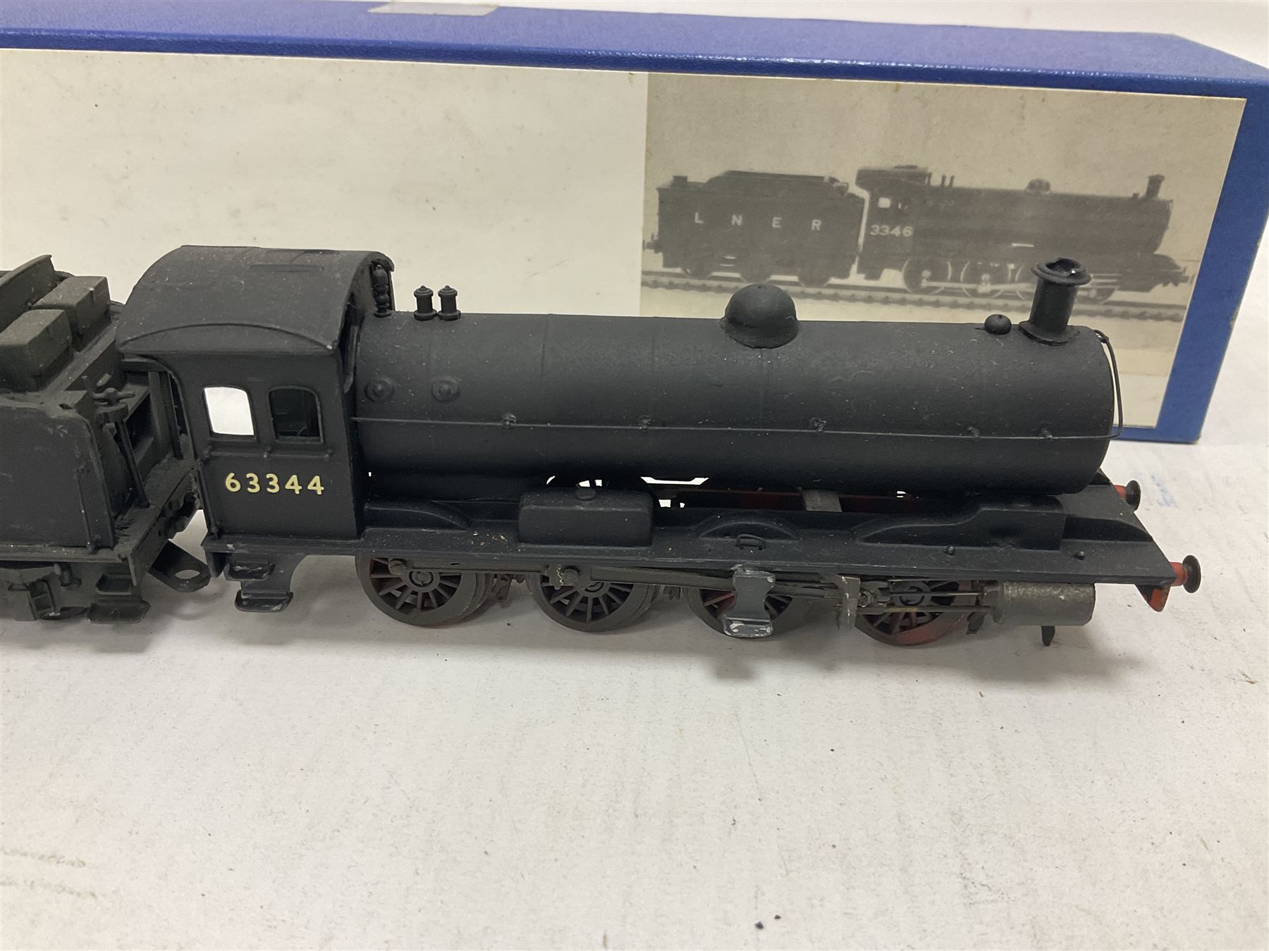 ‘00’ gauge - two kit built steam locomotives comprising unnamed LMS/HR Drummond Class C/BEN 4-4-0 no.54398 finished in BR black; Class Q6 0-8-0 no.63344 finished in BR black; both with Nu-Cast boxes (2) 