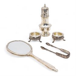 Pair of George III silver salts with later decoration London 1772 Maker Robert Hennell I, silver sugar caster Birmingham 1922, pair of 19th century silver sugar tongs and a silver backed hand mirror