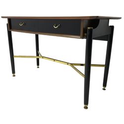 E. Gomme for G-Plan - ‘Librenza’ afrormosia and black finish console, fitted with two drawers, on turned supports united by brass stretchers