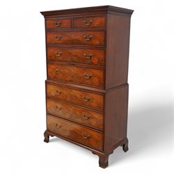 George III mahogany chest-on-chest, projecting moulded and dentil cornice, fitted with two short over six long graduating cock-beaded drawers, each with mahogany band and checkered stringing, brass swan neck handles and circular plates, on ogee bracket feet