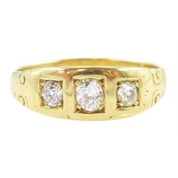 Early 20th century 18ct gold gypsy set, three stone old cut diamond ring, stamped, total d...