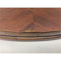 Early 20th century mahogany tray, of oval form with shaped rim and twin brass handles, with inlaid diamond decoration to centre, W67cm