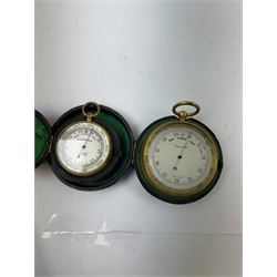 Lowdon Dundee, an early 20th century leather cased pocket barometer with silver dial, D4cm, together with another larger and later example, both cased