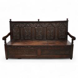 18th century oak settle or bench, moulded cresting rail with globular finials over five pa...