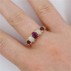 14ct gold five stone oval cut ruby and opal ring, London 2006