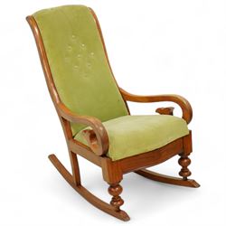 Victorian walnut framed rocking chair, upholstered in sage green buttoned fabric, scrolled arms, on turned front feet with rockers 