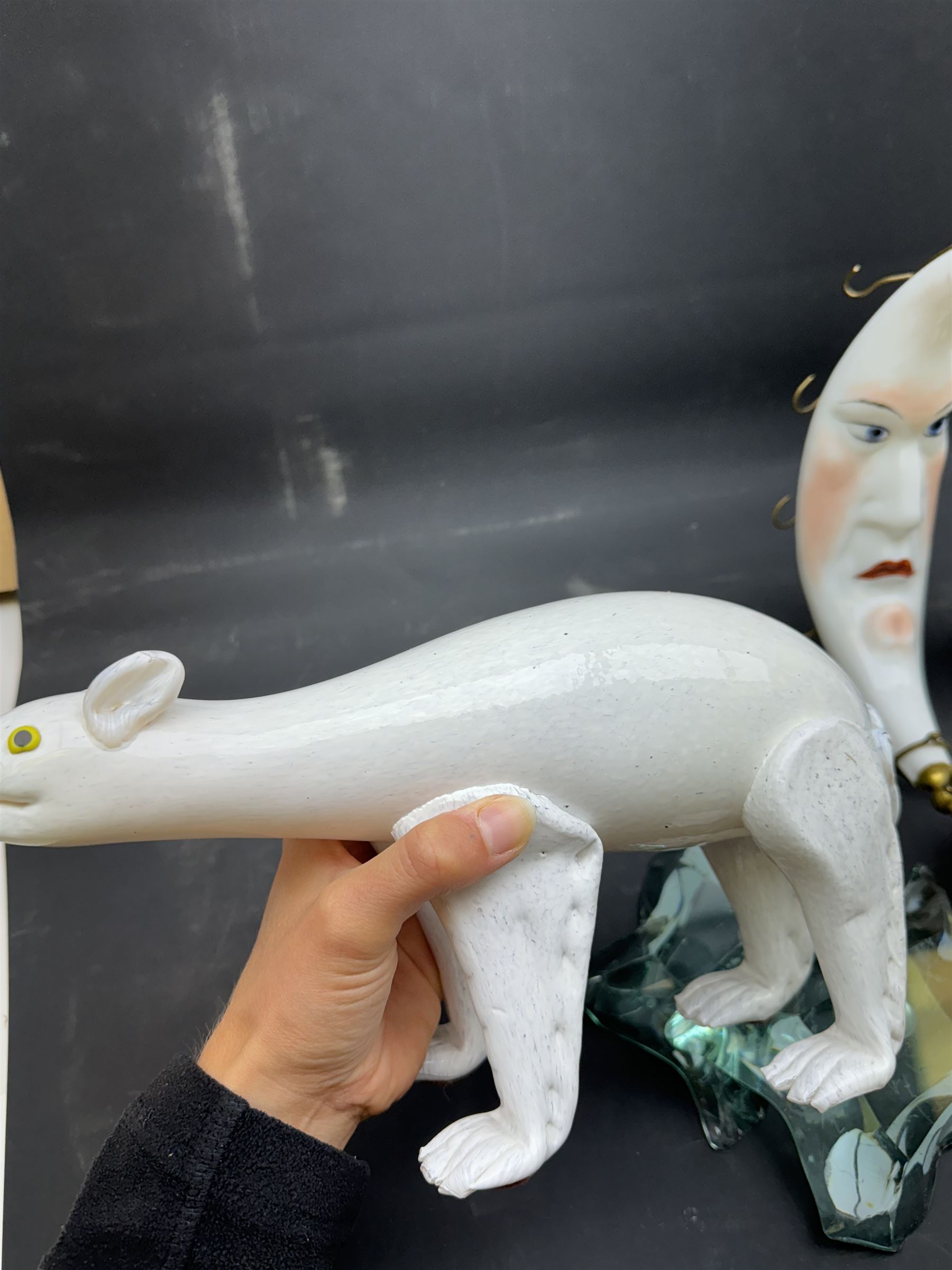 Milk glass decanter, modelled as a moon with a painted face, together with glass animals modelled as a polar bear, turtle and badger, together with other glass  