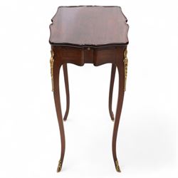 Mid-to-late 20th century French mahogany side table, shaped form with lipped top, single end drawer and opposing slide, on gilt metal mounted cabriole supports 