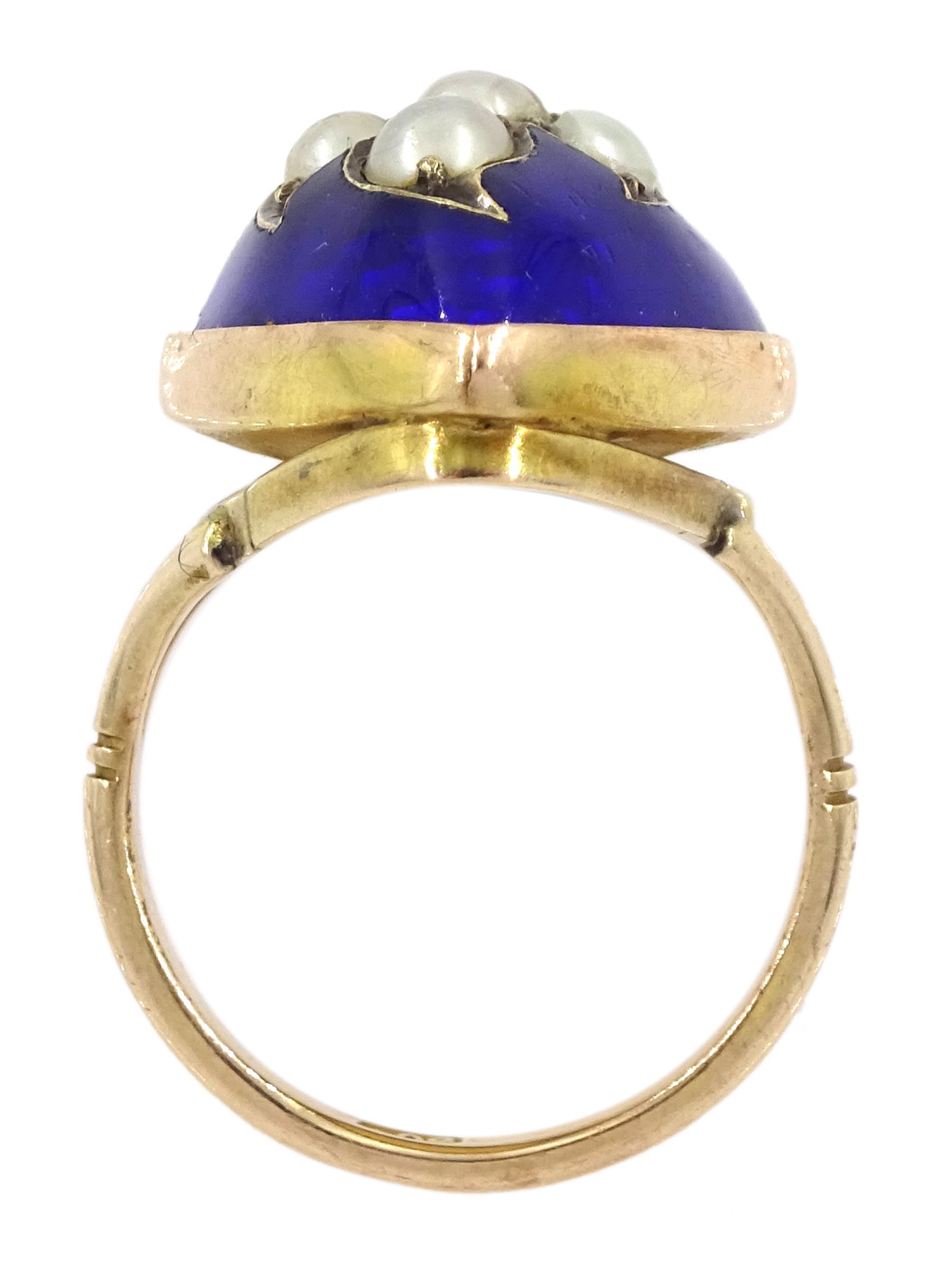 19th / early 20th century 9ct gold marquise shaped ring, the central flower design split pearl  decoration, with blue enamel surround