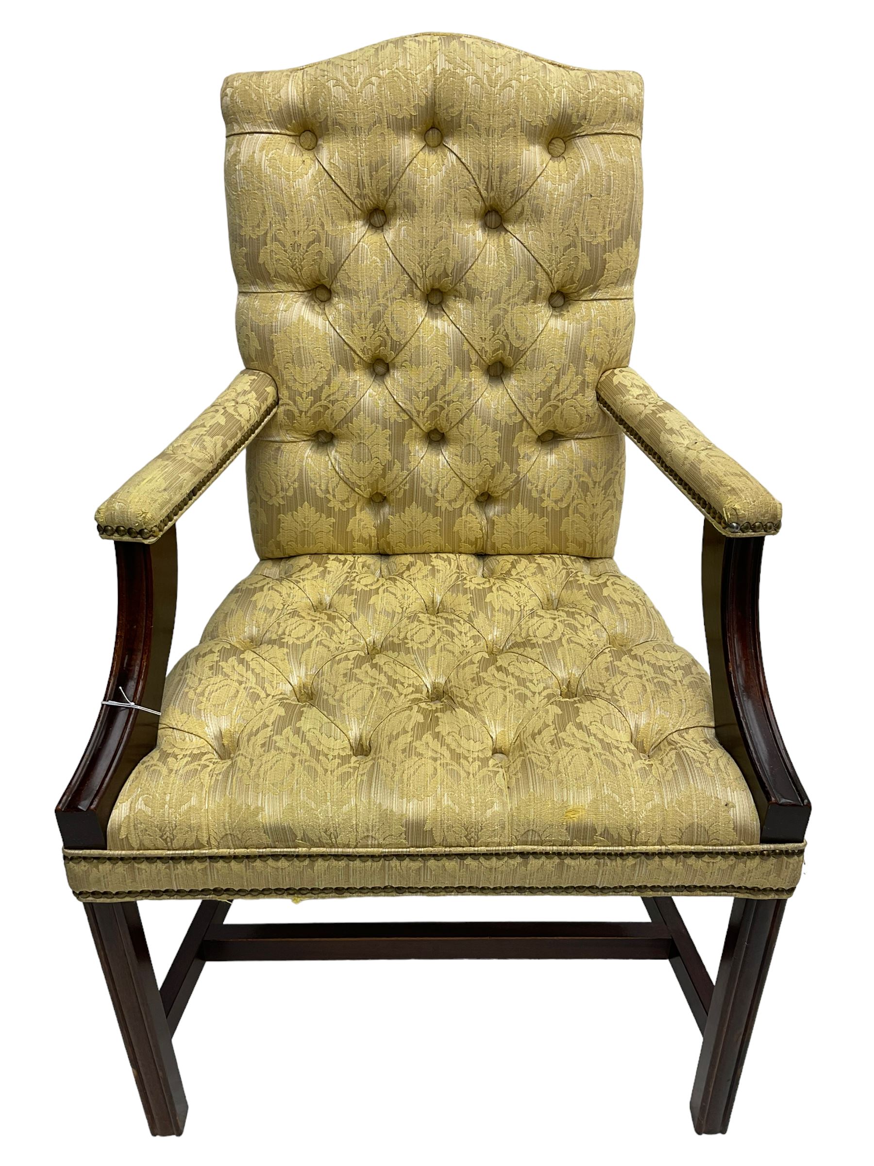 Georgian design mahogany framed Gainsborough open armchair, upholstered in pale gold buttoned fabric with floral pattern, on square moulded supports united by plain stretchers 