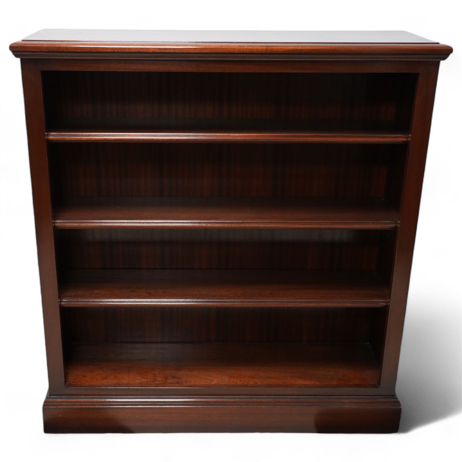 Robert Adam Furniture - Georgian design open bookcase, rectangular top with moulded edge, fitted with four shelves, on skirted base