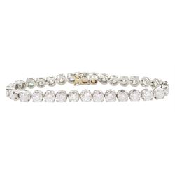 Platinum diamond bracelet, thirty-one round brilliant cut diamonds of approx 16.05 carat, hallmarked