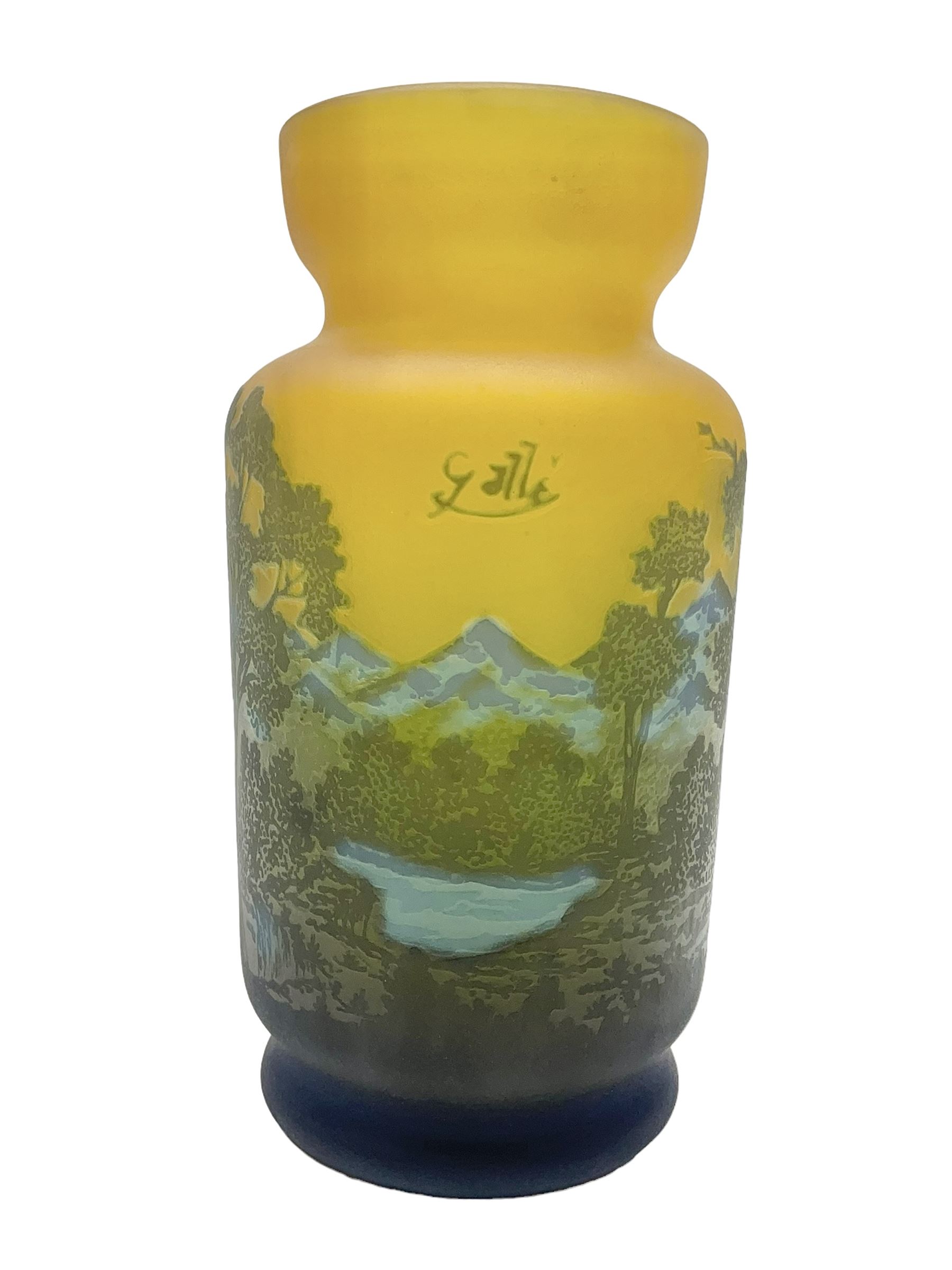 Art Nouveau style glass vase, in the style of Galle,the body decorated with woodland and mountain scene, upon a yellow ground, H20cm 