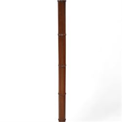 Hardwood simulated bamboo standard lamp, on stepped circular base, with blue pleated shade 