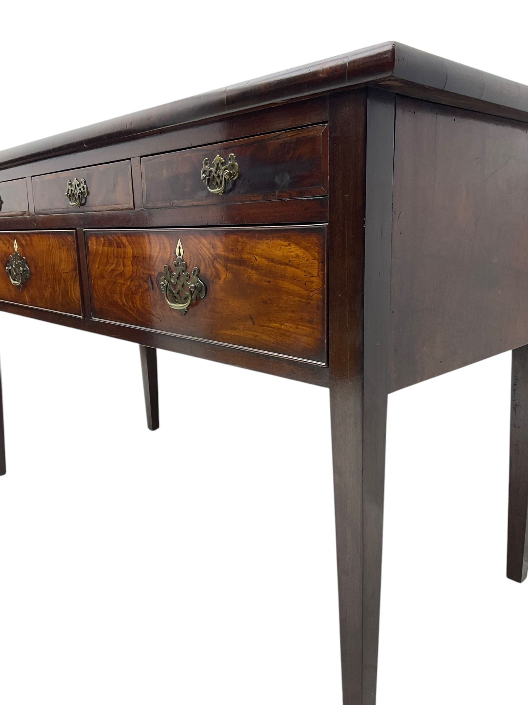 19th century mahogany side table, rectangular top over five drawers, on square tapering supports 