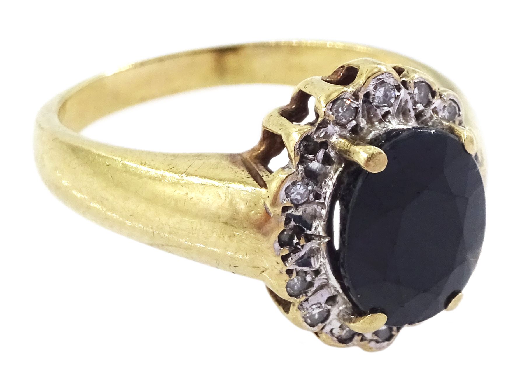 9ct gold oval cut sapphire and round brilliant cut diamond cluster ring, hallmarked