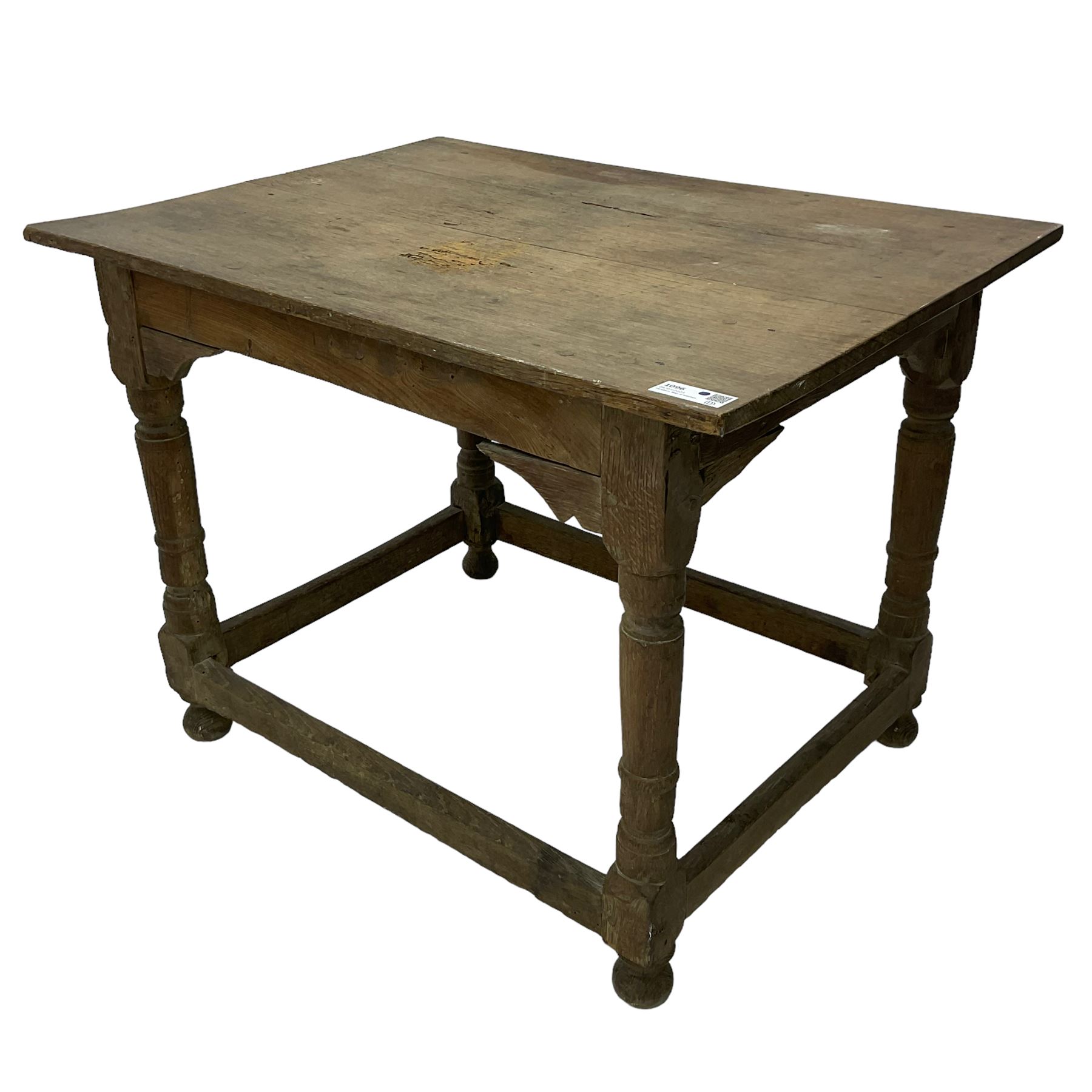 18th century oak joined table, rectangular pegged plank top on turned supports united by plain stretchers