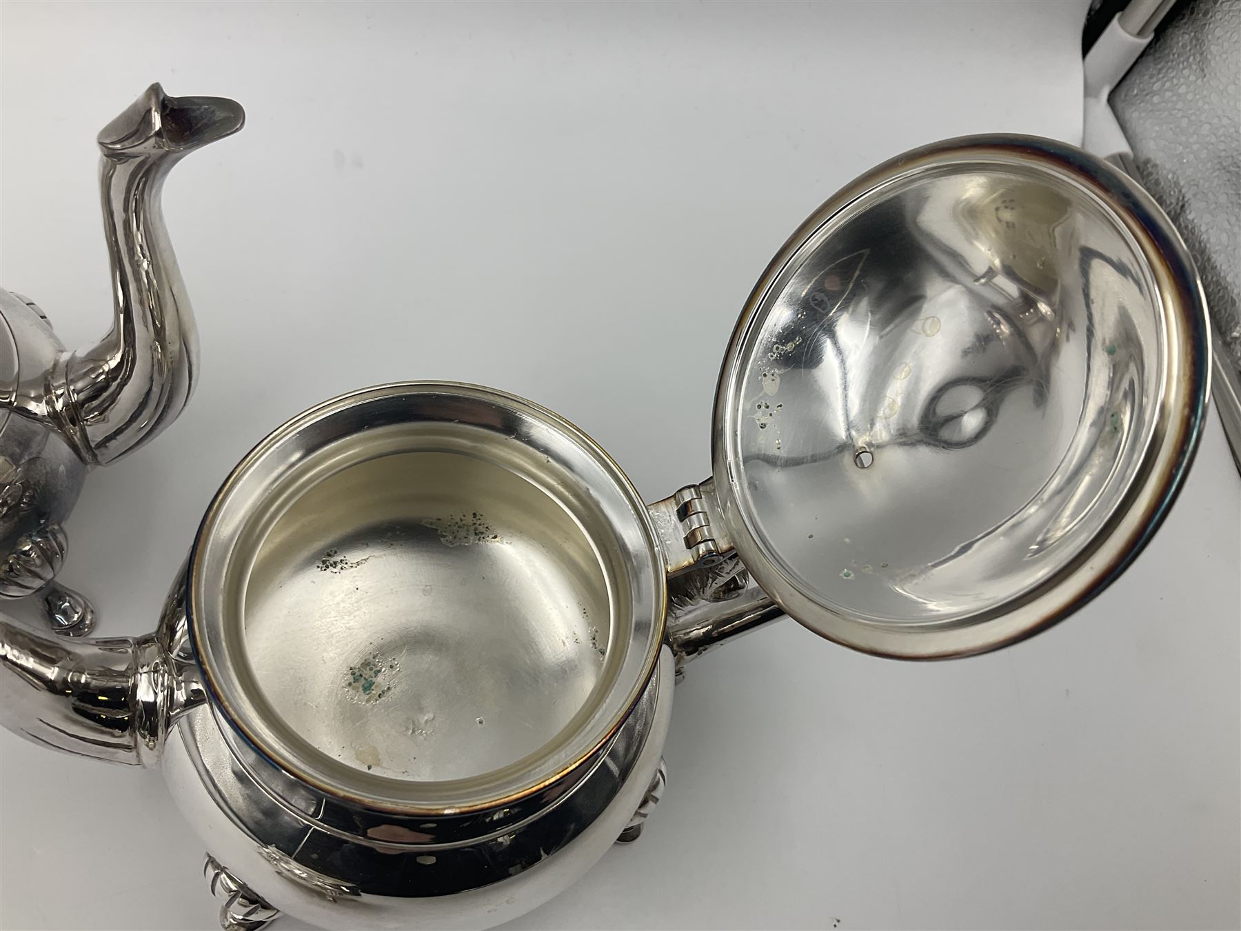 Miniature silver plated four piece tea service, comprising coffee pot, teapot, milk jug and sugar bowl, stamped GRC EPNS beneath, coffee pot H16cm