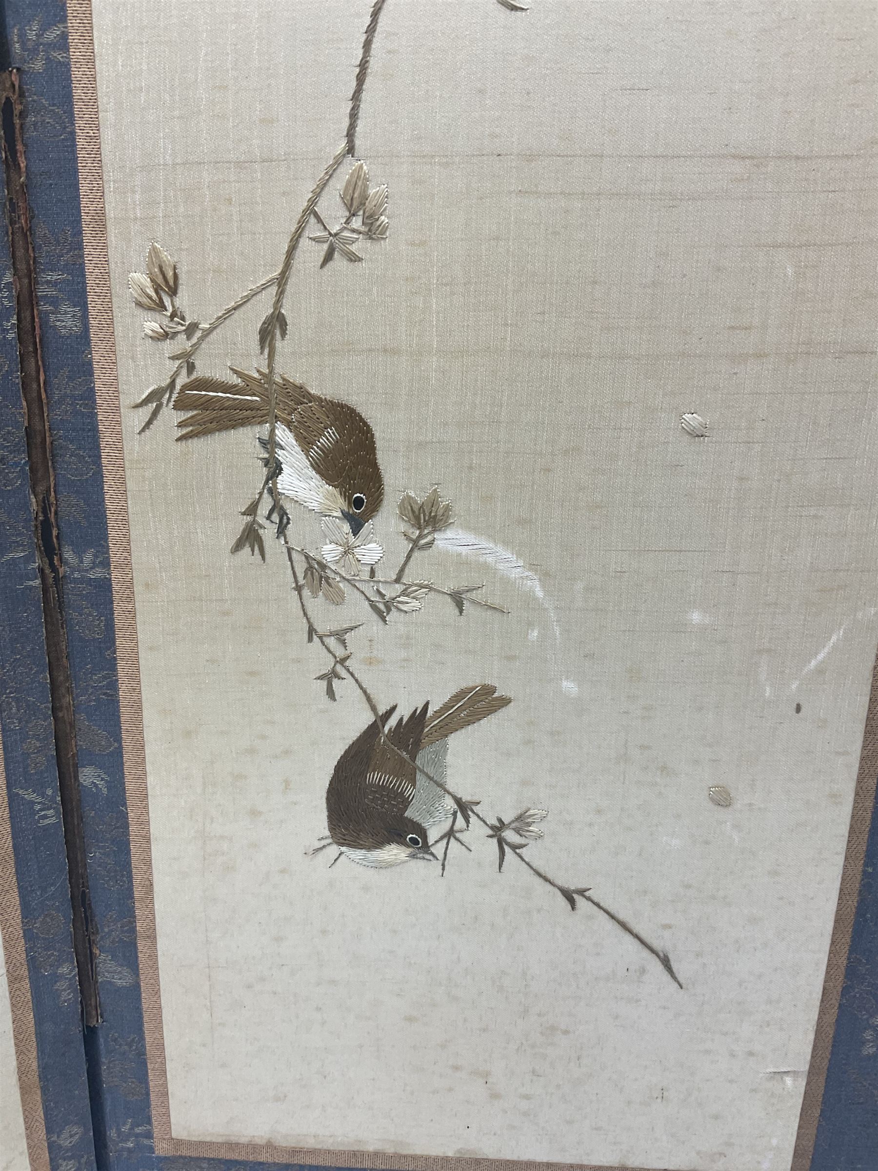 Two Oriental silk and wooden screens embroidered with birds and blossoming branches, largest H88cm 