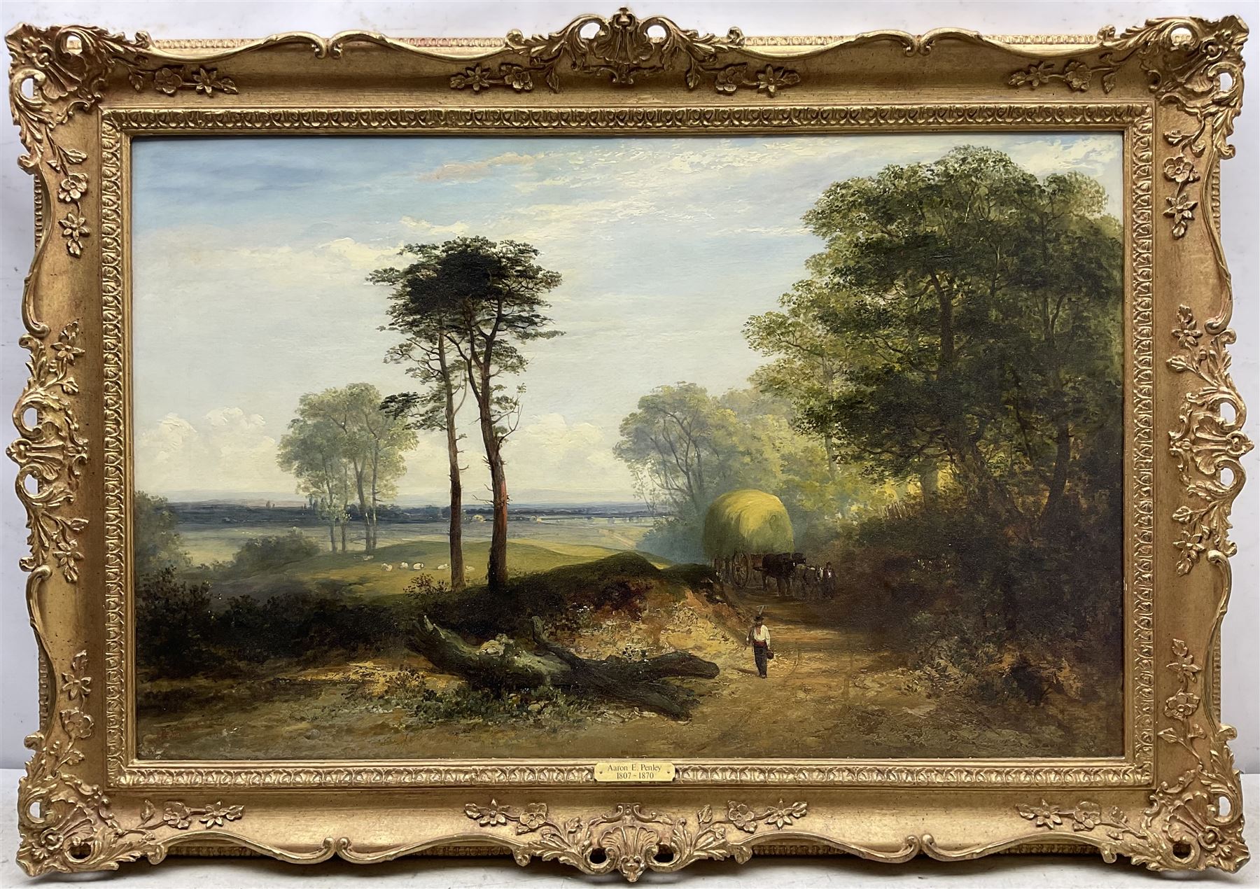 Aaron Edwin Penley (British 1806-1870): Haycart on a Wooded Track, oil on canvas signed and dated 1858, 55cm x 87cm 
Provenance: with WH Patterson, London, label verso