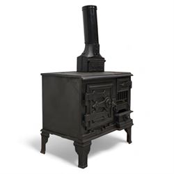 'The Holloway' cast iron portable range stove, fitted with surface burners and oven, on angular bracket feet 