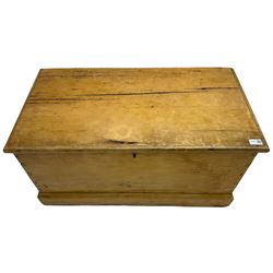 Victorian pine blanket box, fitted with hinged lid and wrought metal carrying handles, on skirted base