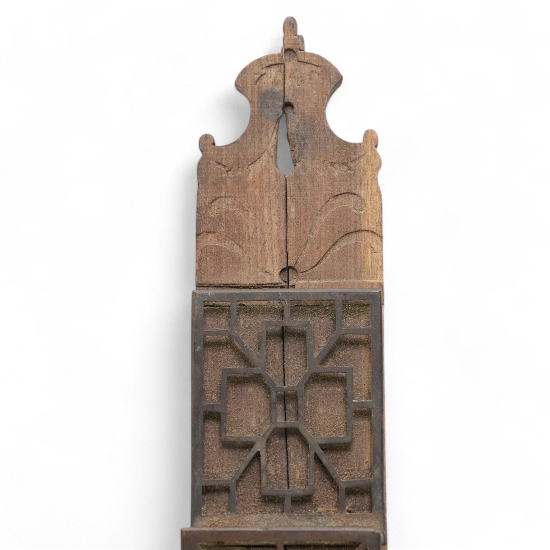 Chippendale design letter rack, the staggered brass panels mounted on a carved oak strip H51cm 