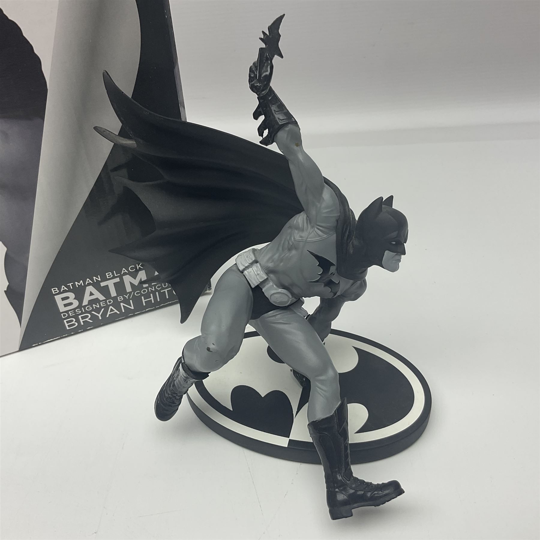 Group of five limited edition DC Direct Black and White Batman hand-painted cold-cast porcelain statues in original boxes, with two similar examples from DC Collectibles 