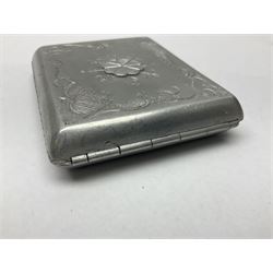 Aluminium cigarette case, by repute made from the R.38. Airship wrecked over Hull August 24th 1921, together with a aluminium matchbox cover, the front inscribed 'R38 WRECKED AT HULL 24 AUG 1921 44 LIVES LOST', the event illustrated verso, (2)