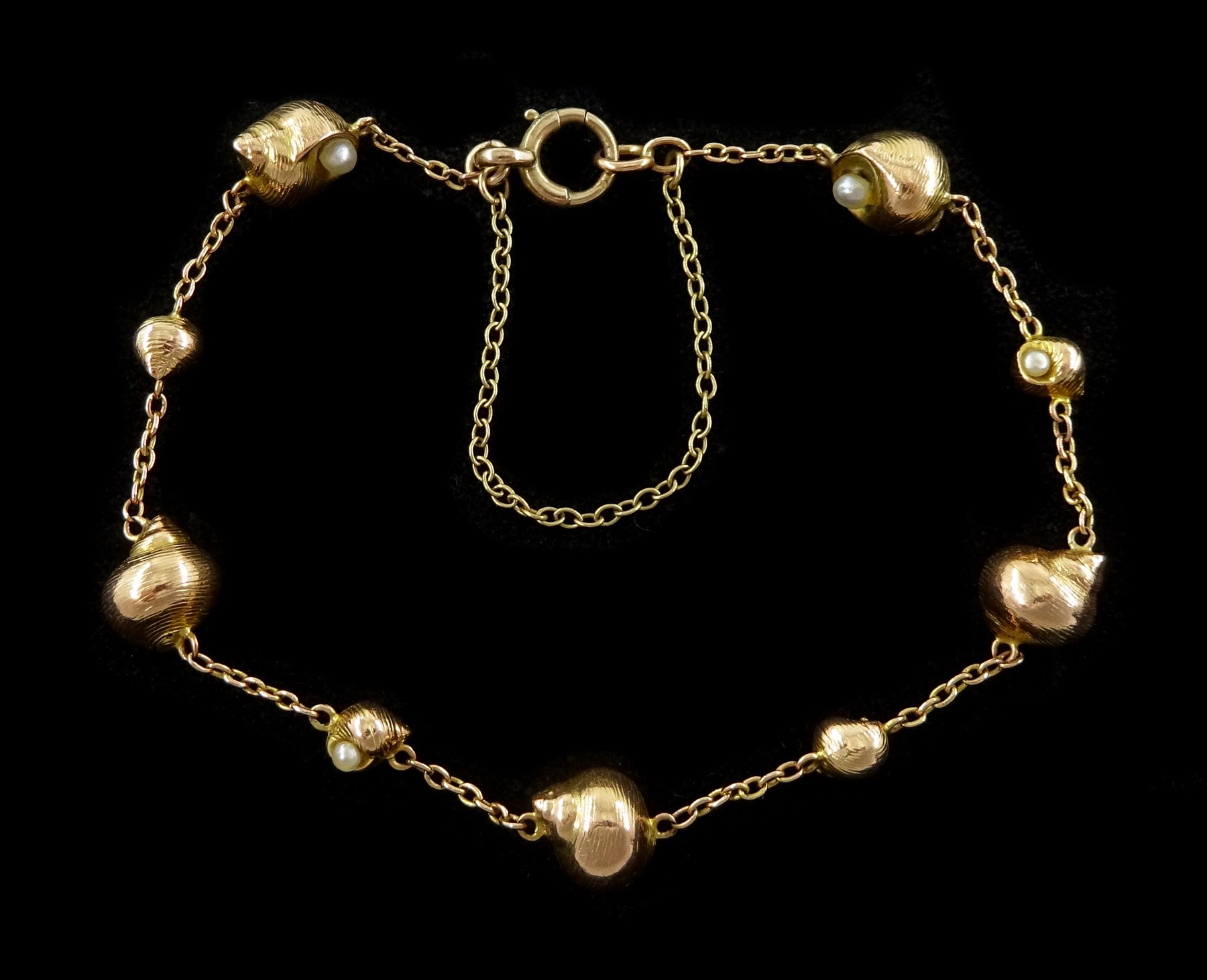 Early - mid 20th century 9ct gold shell design and pearl link bracelet