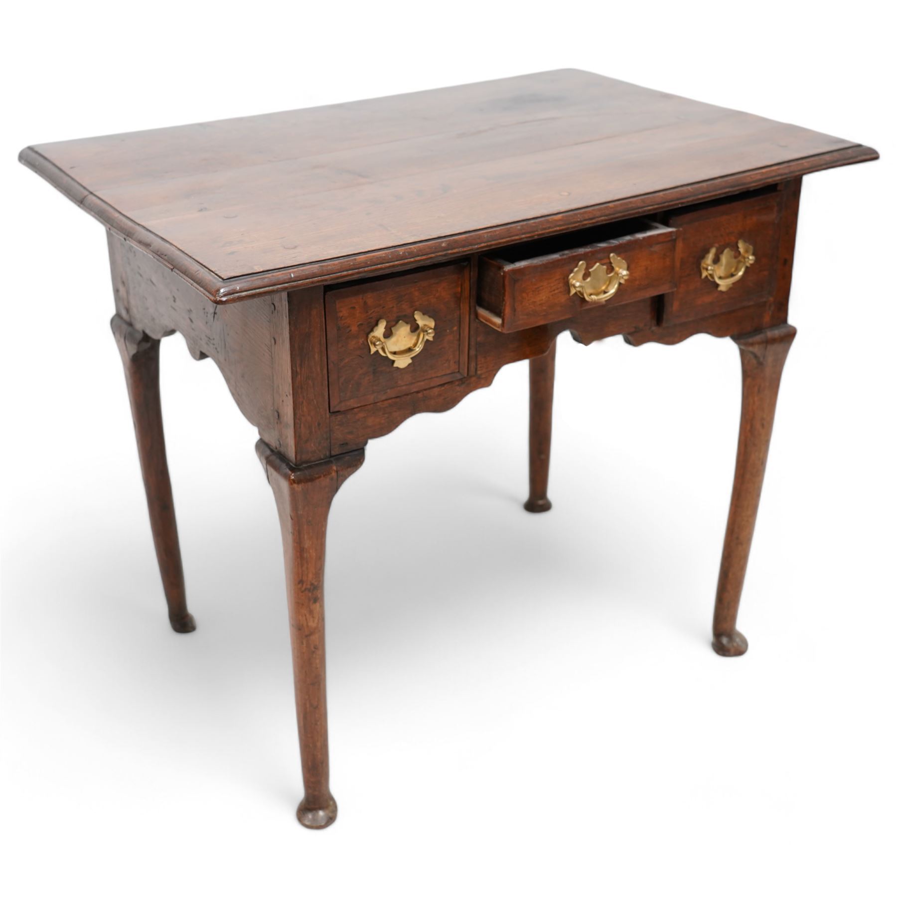 18th century country oak low-boy, rectangular top with moulded edge, fitted with three cross-banded drawers with brass handle plates, shaped apron on cabriole supports with pad feet