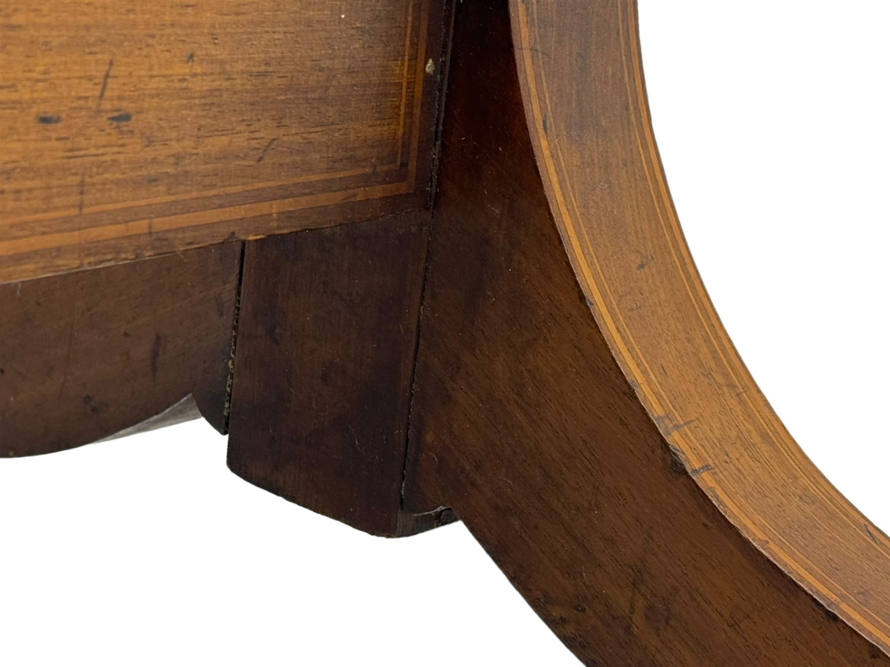 S. & H. Jewell - Edwardian mahogany cheval dressing mirror, shield shaped bevel edged mirror plate within an inlaid mahogany frame, supported by a pair of curved uprights topped with finials and terminating in a scroll design with floral inlay, the reverse bearing makers plaque, standing on four shaped supports fitted with brass castors